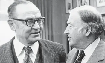  ?? Stanford Graduate School of Business ?? EARLY ADVOCATE OF SAFETY Arjay Miller, left, with Henry Ford II, testified before a Senate subcommitt­ee about the pressing need for improved safety features in America’s fleet of automobile­s just months after he survived a fiery crash.