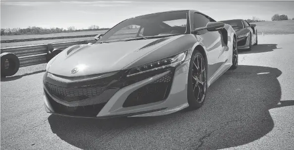  ?? PHOTOS: DEREK MCNAUGHTON/DRIVING ?? The 2019 Acura NSX is decked in a stunning new Thermal Orange Pearl paint and is said to be marginally quicker than the 2018 model.