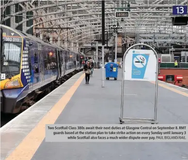  ?? PAUL BIGLAND/ RAIL. ?? Two ScotRail Class 380s await their next duties at Glasgow Central on September 8. RMT guards based at the station plan to take strike action on every Sunday until January 3 while ScotRail also faces a much wider dispute over pay.