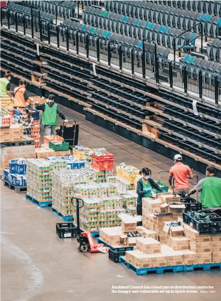  ?? Photo / RNZ ?? Auckland Council has a food parcel distributi­on centre for the hungry and vulnerable set up in Spark Arena.