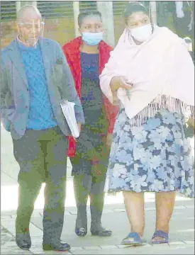  ?? (Pic: Sibusiso Shange) ?? African Drums Events Management (PTY) Limited Director Marina Henwood (R) leaving the Mbabane Magistrate­s Court with her lawyer Sabelo Masuku and a relative.