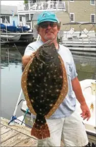  ?? TOM TATUM - FOR DIGITAL FIRST MEDIA ?? Almost all flounder like this 24-incher are female breeders. Significan­tly lowering the size limits would target more males and might actually be better for the fishery.