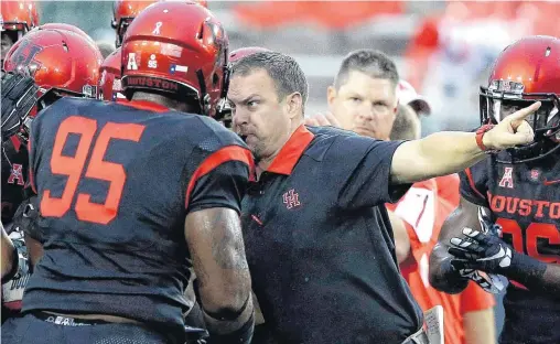  ?? [AP PHOTO] ?? Tom Herman’s Houston Cougars open their season Saturday against OU.