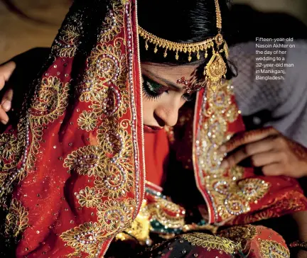  ??  ?? Fifteen-year-old Nasoin Akhter on the day of her wedding to a 32-year-old man in Manikganj, Bangladesh.