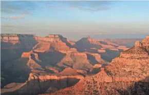  ?? CRAIG MELLISH ?? Sunset is seen on the south rim of the Grand Canyon. November weather can be comfortabl­e at the canyon.