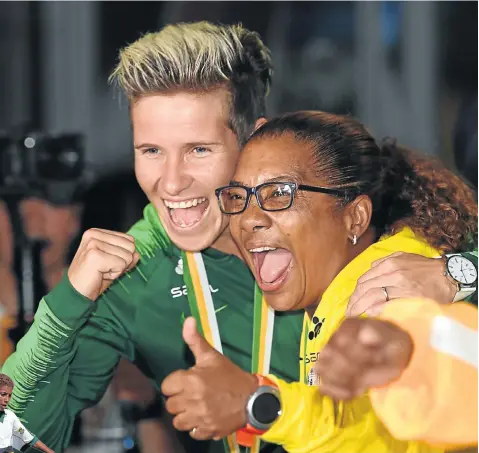  ?? Warren/Gallo Images Picture: Duif du Toit/Gallo Images Picture: Lee ?? Desiree Ellis with Banyana Banyana captain Janine van Wyk after arriving home from the Africa Women Cup of Nations this week. Left, Ellis in her playing days.