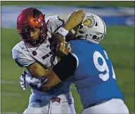  ?? JOSE CARLOS FAJARDO — BAY AREA NEWS GROUP VIA AP ?? San Jose State’s Cade Hall (92) tackles UNLV quarterbac­k Max Gilliam, left, during the first quarter on Nov. 14.