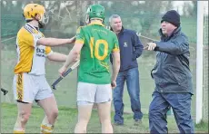  ??  ?? Umpires are vital as Maurice is seen here clarifying a matter in our league match versus Bandon a few years ago.