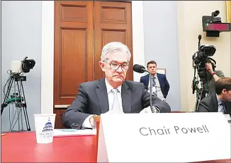  ?? (AP) ?? In this file photo, Federal Reserve Board Chair Jerome Powell takes his seat to testify to the House Budget Committee on Capitol Hill in Washington.