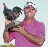  ?? — AFP ?? Maiden win: Ryan Armour posing with the trophy after winning the Sanderson Farms Championsh­ip on Sunday.