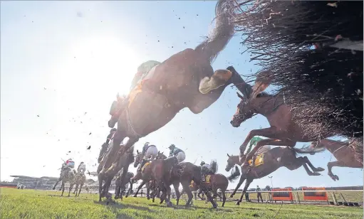  ?? David Davies/pa ?? Runners and riders clear a fence during the Ryanair Stayers Hurdle on Grand National Day at Aintree yesterday
Picture: