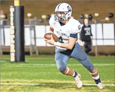  ?? Jan Wright ?? Gordon Lee’s Brody Cobb looks to return a kick upfield during the Trojans’ second-round playoff game at Commerce on Friday night. The Tigers would end Gordon Lee’s season with a 28-14 victory.