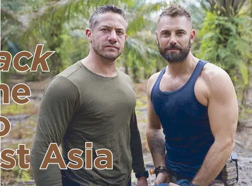  ??  ?? Strike Back stars Warren Brown (left) and Daniel MacPherson take a break from filming intense action scenes at their set location in Johor Bahru in Malaysia