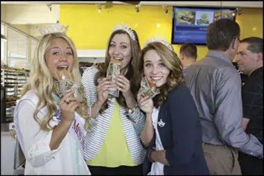  ?? Submitted by Wendy Widdison ?? Jezni Widdison Miss Springvill­e/ Mapleton20­14, Madi Monson 1st Attendant, Erin Thomas 3rd Attendant sampling some tasty donuts at the Ribbon Cutting for Dayligh Donuts in north Springvill­e.