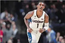  ?? AP FILE PHOTO ?? Guard Christian Vital, despite standing only 6-foot-2, leads UConn in rebounding heading into the AAC tournament on Thursday.