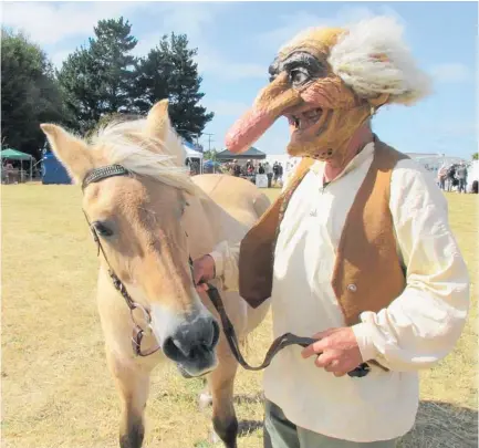  ??  ?? Troll Steve Crutchley of Christchur­ch provided an authentic touch to last year’s festival with Fjord horse Mimi.