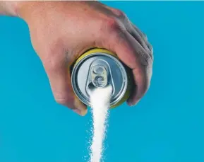  ??  ?? Find an alternativ­e to sugar- laden cans of fizzy drink