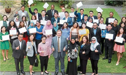  ??  ?? New horizons: Hay (front row, centre) with successful Chevening applicants in Kuala Lumpur.