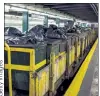  ??  ?? The yellow garbage trains you see late at night dump their refuse at train yards at 207th Street, 239th Street, 36-38th Street and in Corona.