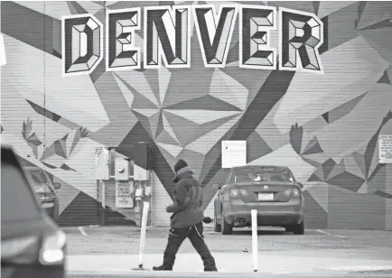  ?? DAVID ZALUBOWSKI/AP ?? Interested in exploring street art? You can take a 5-mile graffiti tour in Denver.