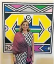  ??  ?? Mexican ambassador to South Africa, Ana Luis Fajer, stands with Esther Mahlangu’s Ndebele Abstract 2019 at the residence of the French ambassador.