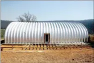  ?? LYNN KUTTER ENTERPRISE-LEADER ?? This Quonset hut will serve as Zack and Laura’s home and office and a section will be used as a large entertainm­ent and community room for guests of Flamingo Springs Trailer Resort. A deck is under constructi­on outside the hut.