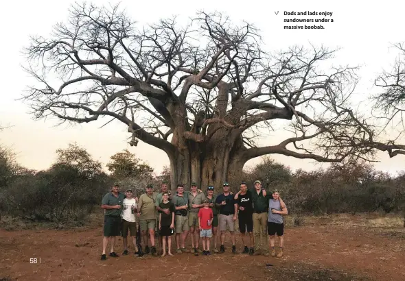  ??  ?? Dads and lads enjoy sundowners under a massive baobab.