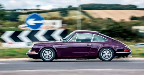  ??  ?? Above: The Aubergine paintwork really stands out – it was a brave decision to paint the car this colour but the end result is stunning