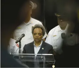  ?? CASSELLA/CHICAGO TRIBUNE ?? Mayor Lori Lightfoot speaks alongside Chicago Fire Department personnel at a press conference on April 5, 2023.BRIAN