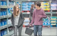  ??  ?? FINDING THEMSELVES: Cara Delevingne as Margo and Nat Wolff as Q.