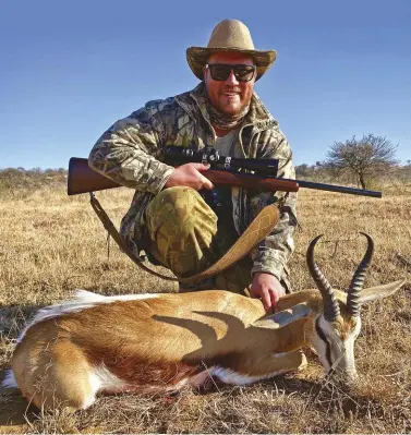  ??  ?? Author with the beautiful springbuck ram he shot on the second morning.