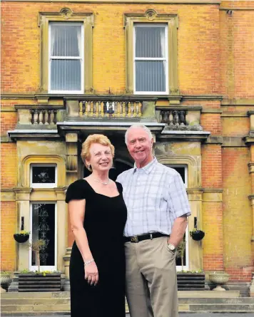  ??  ?? Mr and Mrs Chester outside Woodhead Hall, which they bought in 1995.