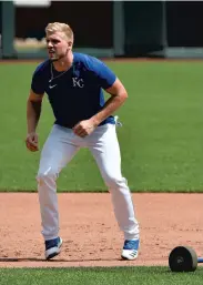  ?? ED ZURGA/GETTY ?? Hunter Dozier takes a lead off of second during base running drills on July 3 at Kauffman Stadium Kansas City, Missouri.