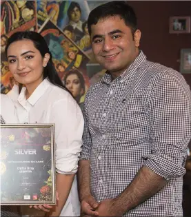  ??  ?? ABOVE: Wang Yin, Maeve O’Malley, Mehwish Ghani, Shamim Akhter, Alihan Saleem and Waseem Saeed with the award won by Daata.