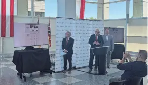  ?? ABBY BAMMERLIN/COLUMBUS DISPATCH ?? Charlie Norman, Ohio’s Registrar of Motor Vehicles, explains the new online driver’s license renewal portal that will take users about three minutes to fill out. Along with Gov. Mike Dewine and Lt. Gov. Jon Husted, Norman hopes the online portal will collective­ly save Ohioans millions of hours of waiting in line.