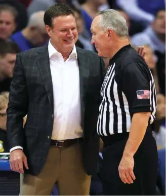  ?? AP FILE PHOTO/ORLIN WAGNER ?? Kansas coach Bill Self, left, and the school’s tradition-rich men’s basketball program are in the crosshairs of the FBI’s investigat­ion of corruption.