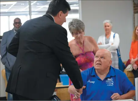  ?? MARIAN DENNIS — MEDIANEWS GROUP ?? State Rep. Joe Ciresi shakes Jim Frymoyers hand as he hands him a certificat­e recognizin­g his 40 years of community service.