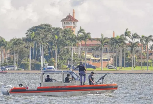  ?? J. DAVID AKE/ AP ?? A U. S. Coast Guard patrol boat passes President Donald Trump’s Mar- a- Lago estate in Palm Beach, Florida, in 2018. Trump bought the property in 1985.