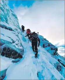  ?? Photograph: Arrochar MRT. ?? Arrochar Mountain Rescue team on a recent exercise on Beinn Ime.