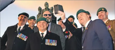  ?? Photograph: Iain Ferguson, The Write Image ?? Veterans at the Commando Memorial take a quick selfie.