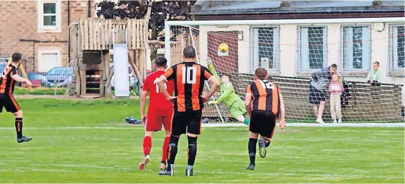  ?? ?? In control Tam Nelson completes the scoring from the penalty spot