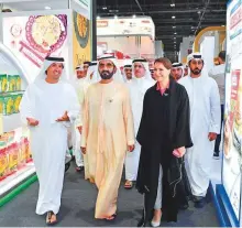  ??  ?? Shaikh Mohammad tours Gulfood 2020 with Abdul Rahman Al Owais and Mariam Al Muhairi and other officials yesterday.