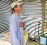  ??  ?? REASON TO SMILE: Lindile Bhamba, a destitute man in Nemato, has been amazed by the help he has been given to better his living circumstan­ces