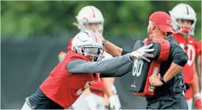  ?? ADAM CAIRNS/COLUMBUS DISPATCH ?? Garrett Wilson (5) teams with Chris Olave to give Ohio State one of the nation’s best receiving duos.