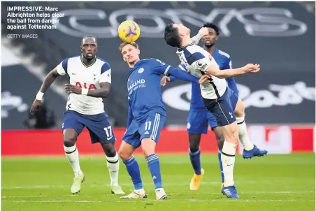  ?? GETTY IMAGES ?? IMPRESSIVE: Marc Albrighton helps clear the ball from danger against Tottenham