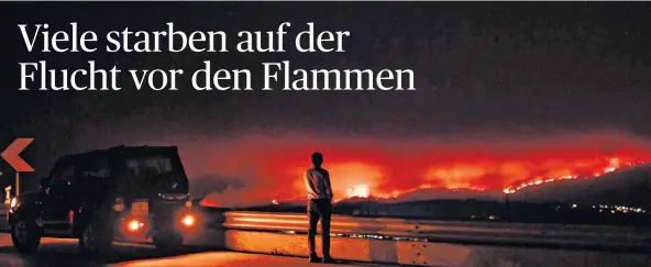  ?? FOTO: AFP ?? Ein Mann beobachtet das Feuer von weitem.