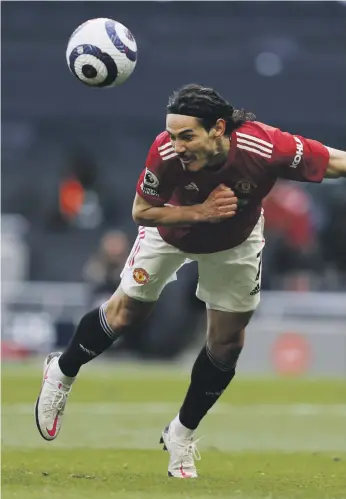  ?? Reuters ?? Edinson Cavani heads home Manchester United’s second goal against Tottenham yesterday