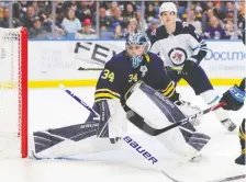  ?? TIMOTHY T LUDWIG/GETTY IMAGES ?? In the final 12 minutes of the game, Sabres’ Jonas Johansson stopped the Jets’ only two shots on goal.