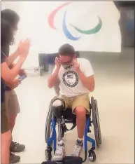  ?? Gil Torres / Contribute­d photo / ?? Matthew Torres, 20, from Ansonia won the bronze medal in the men's 400-meter S8 freestyle in Tokyo at the 2020 Paralympic­s. He returned home to Connecticu­t on Monday.