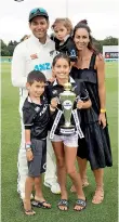  ?? ?? New Zealand’s Ross Taylor (L) poses with his wife Victoria (R), daughters Adelaide (C), Makenzie (centre top) and son Jonty (front L) after his last Test match following day three of the second cricket Test match between New Zealand and Bangladesh in Christchur­ch